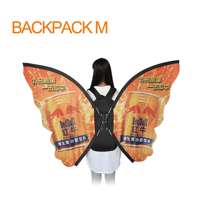 Dynamic M-Shape Advertising Backpack for Outdoor Events M-Shaped Walking Backpack with Red Bull Branding – Orange Butterfly Wing Advertising Display