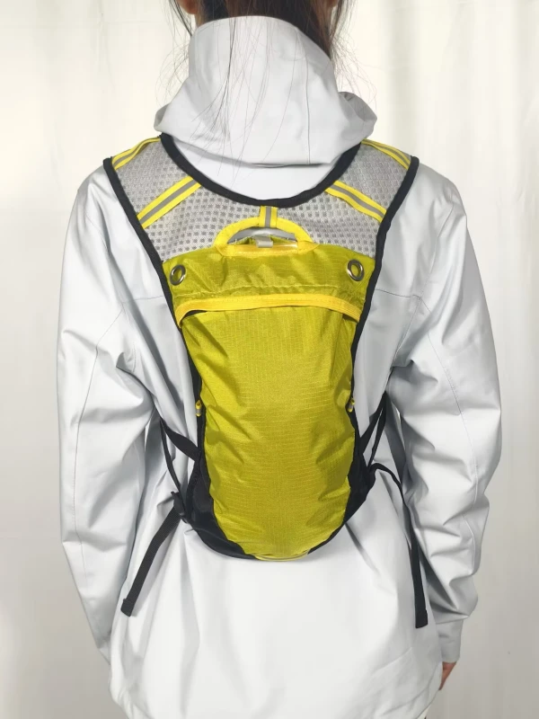 front view front view:backpack with reflective strips and torso adjustment system for marathon pacers