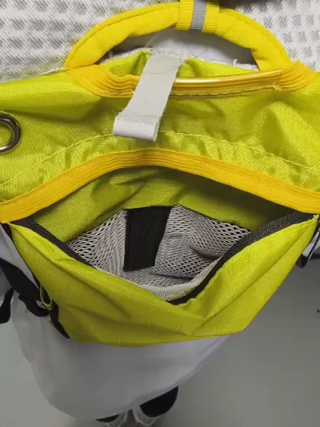pacer backpack inside view Gray sleeveless marathon pacer flag backpack with yellow pockets, adjustable black straps