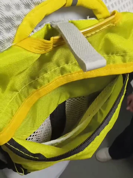 pacer backpack inside view Bright yellow vest backpack with mesh back panel, metal hydration rings and adjustable straps for cycling/running