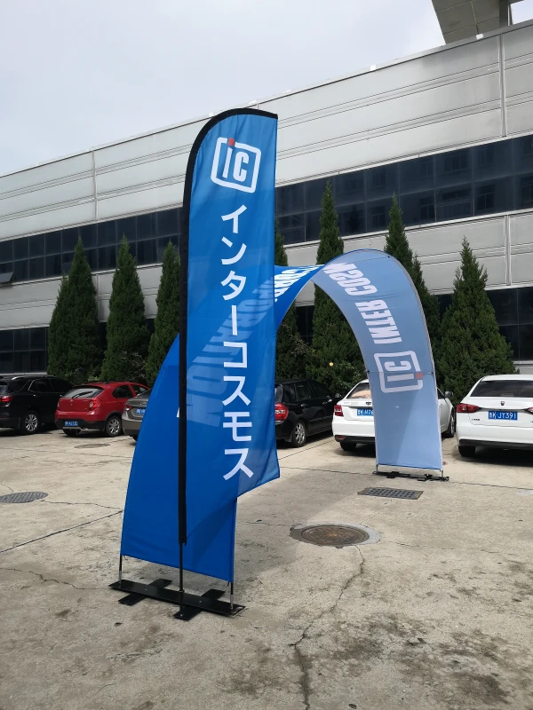 Blue custom arch banner stand with vertical feather flag for outdoor brand promotion