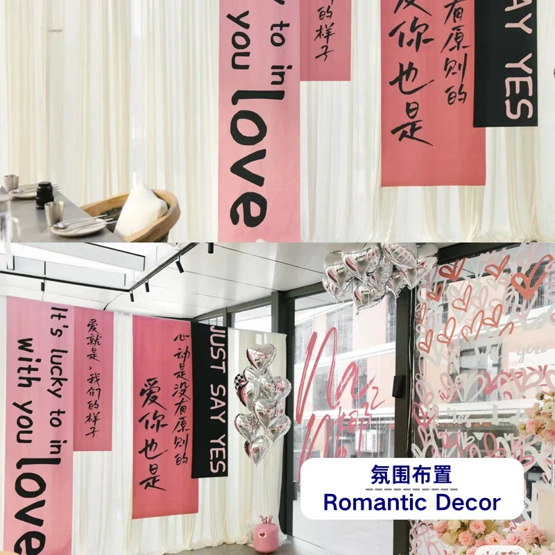 Pink love-themed hanging banner flags with “Just say yes” for weddings, heart balloons on
white curtains