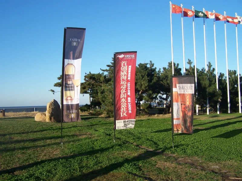 Mixed portrait flags in outdoor setting