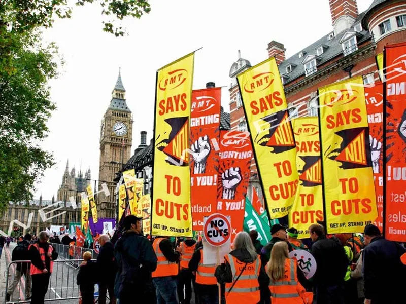 RMT union protest portrait flags - Yellow/red SAYS NO TO CUTS banners with Big Ben backdrop