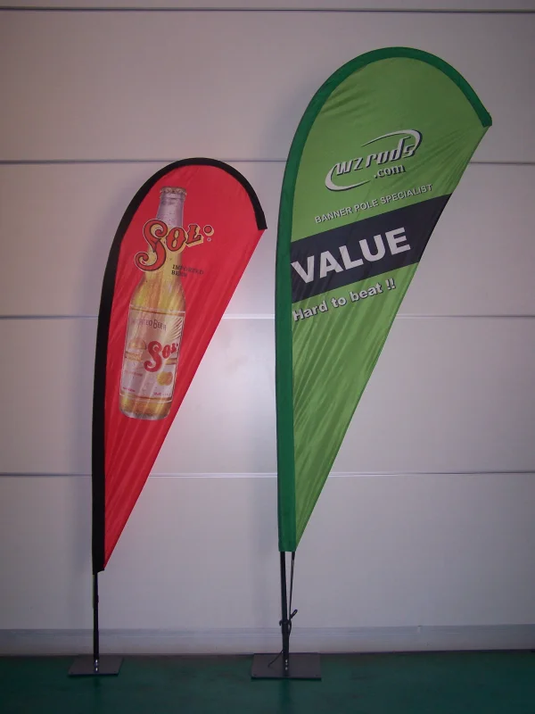 Red Sol beer teardrop flag paired with green wzrods.com banner specialist teardrop flag