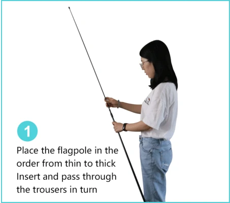 Woman arranging flagpole sections from thin to thick for assembly